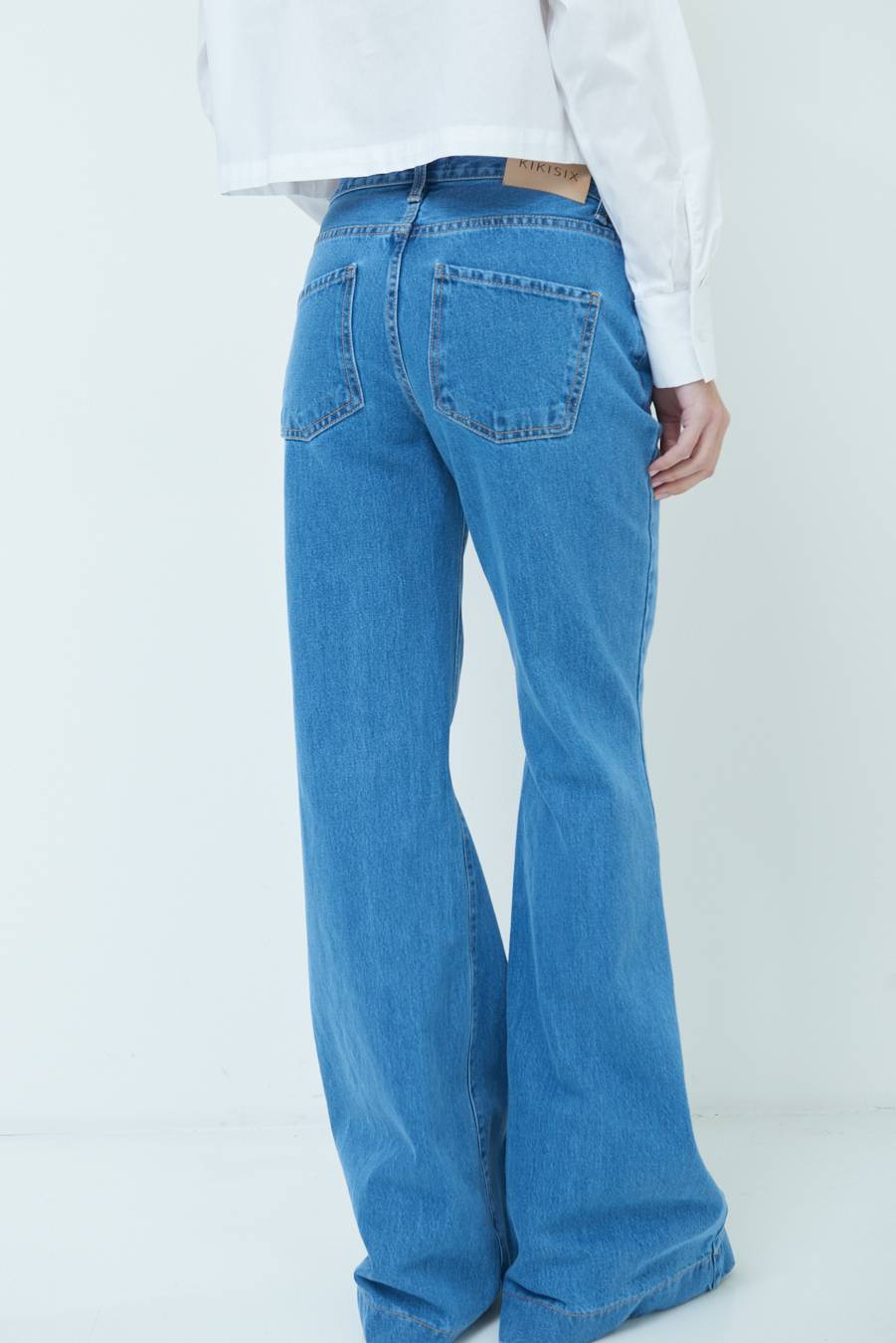 Kikisix PANTALONE ZAMPA CON RIBALTA DOPPIO STONE JEANS In Saldo