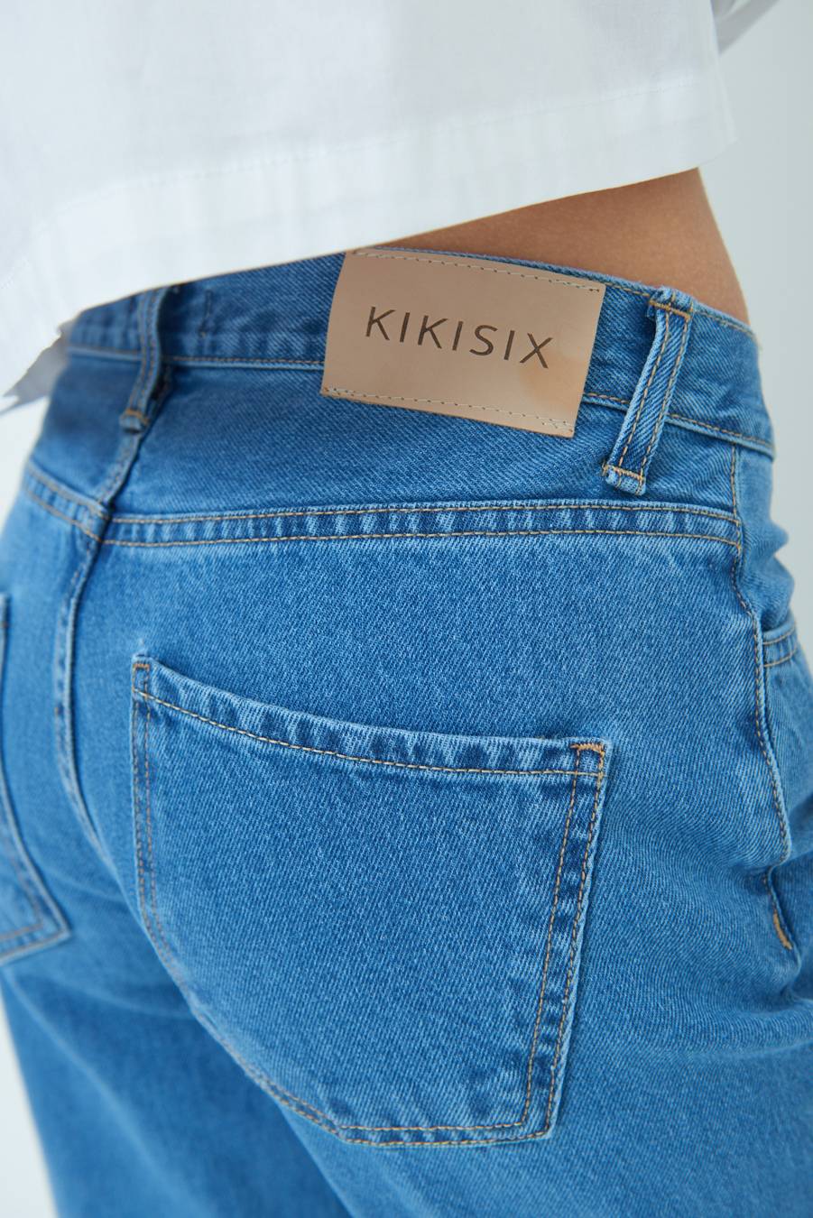Kikisix PANTALONE ZAMPA CON RIBALTA DOPPIO STONE JEANS In Saldo