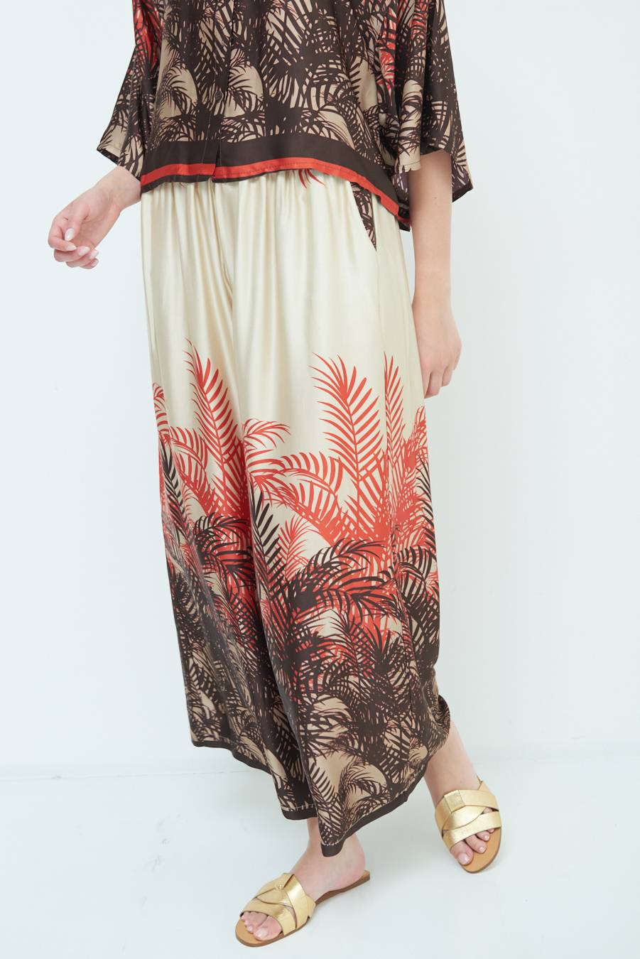 Kikisix PANTALONE PALAZZO FANTASIA BALZA MORO/ARANCIO Italy