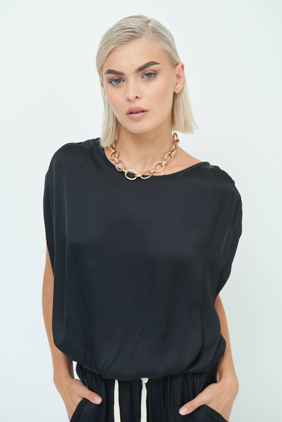Kikisix TOP CON ELASTICO FONDO SCOLLO BALA NERO Economico