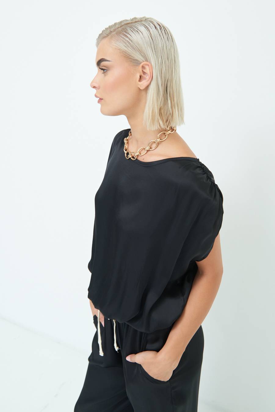 Kikisix TOP CON ELASTICO FONDO SCOLLO BALA NERO Economico