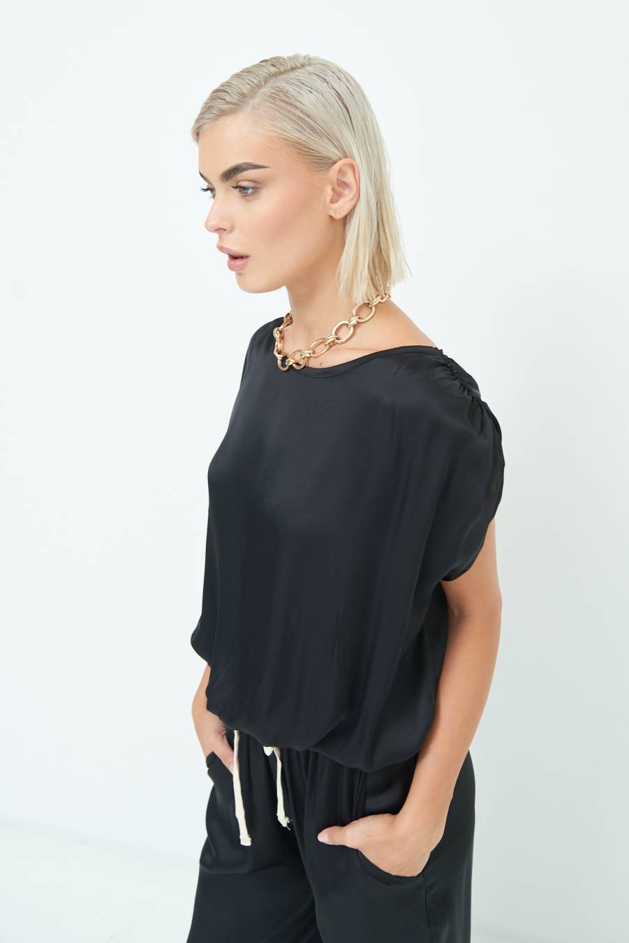 Kikisix TOP CON ELASTICO FONDO SCOLLO BALA NERO Economico