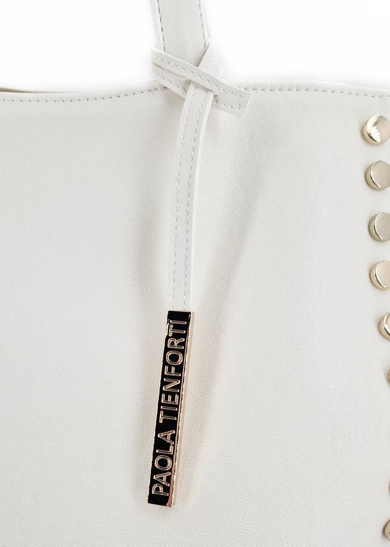 Paola T. Shopper con rivetti e pendente oro Sottocosto