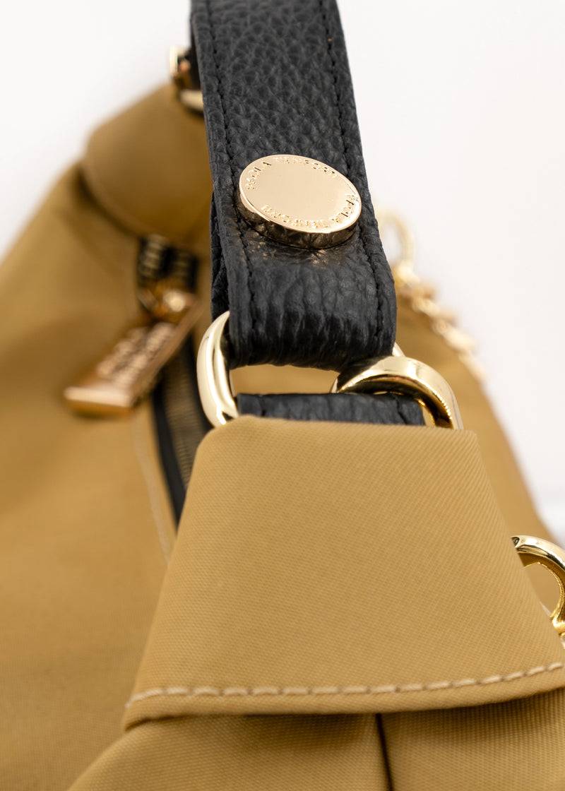 Paola T. Borsa a sacca in nylon con dettagli oro Acquista Ora