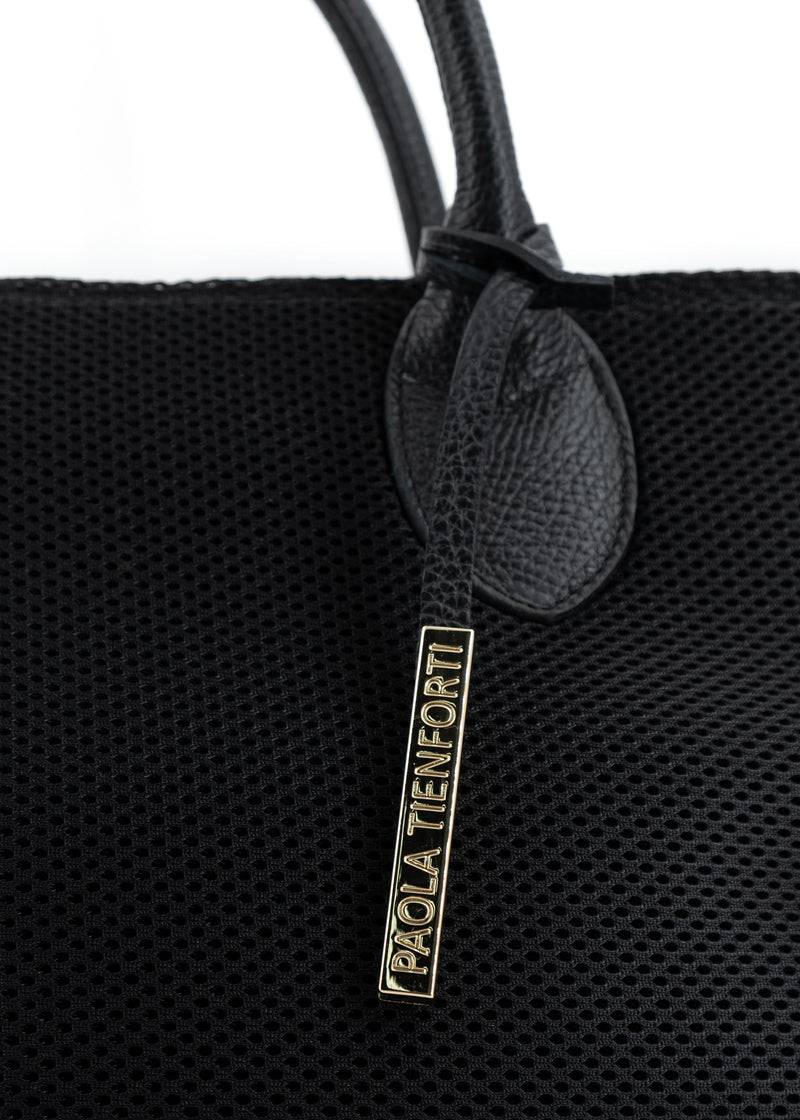 Paola T. Shopper in traforato con pendente argento Novità